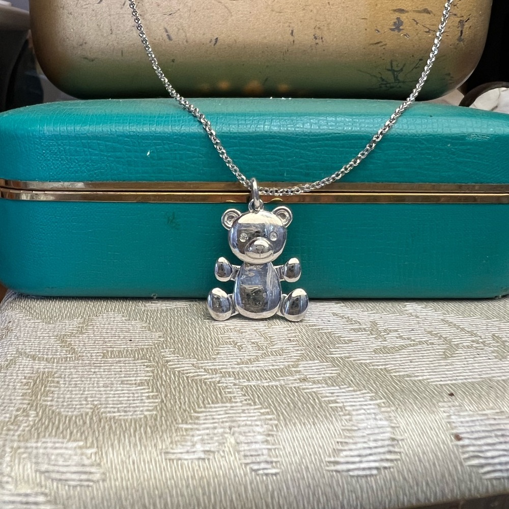 Charles Garnier, Sterling, silver teddy bear pendant with diamond eyes and chain